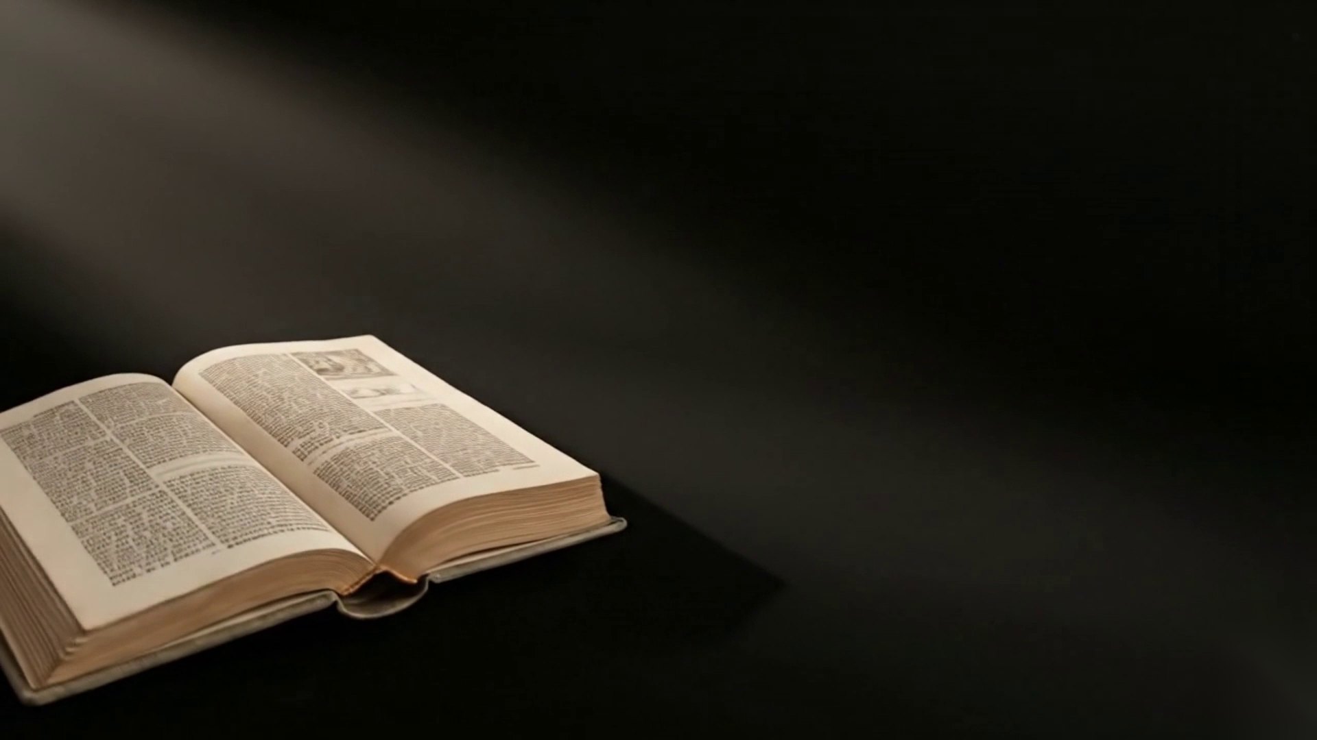 An open book in a shaft of light, from the Articlefoundry video